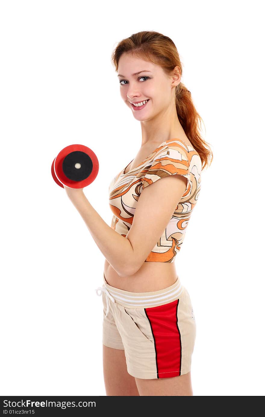 Young beautiful woman with dumbbell. Isolated over white background.