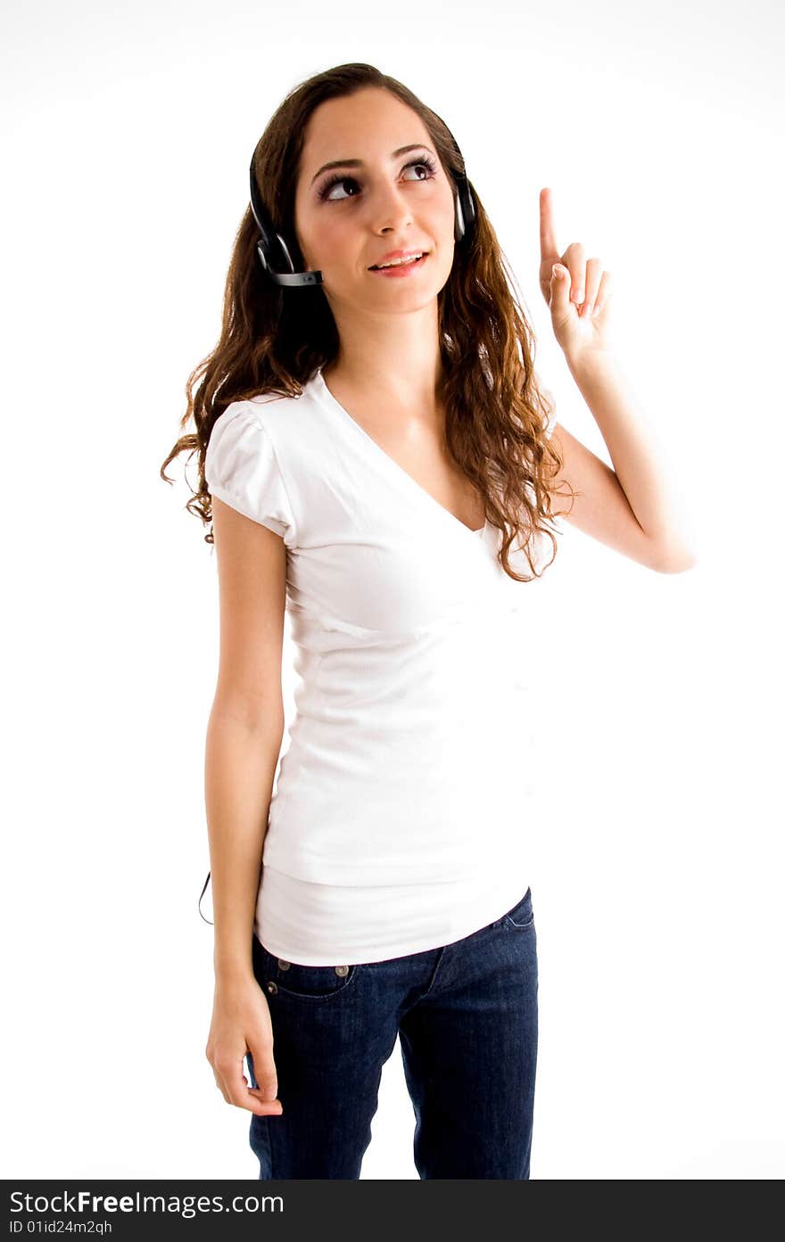 Young pointing female with headphone