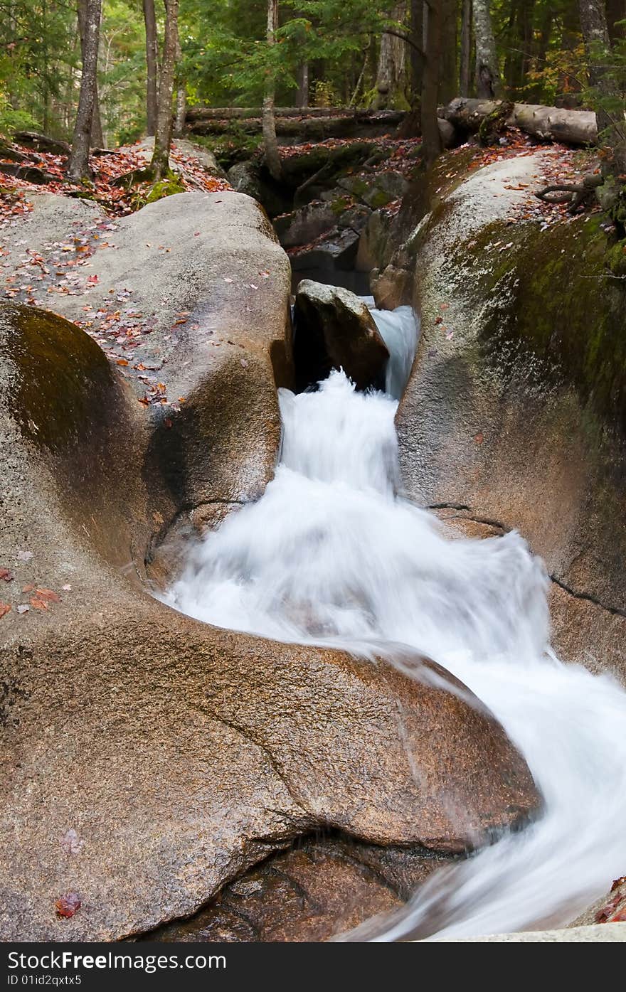 A waterfall on a fall day