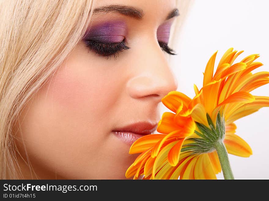 Young fashion woman with gerbera. Young fashion woman with gerbera