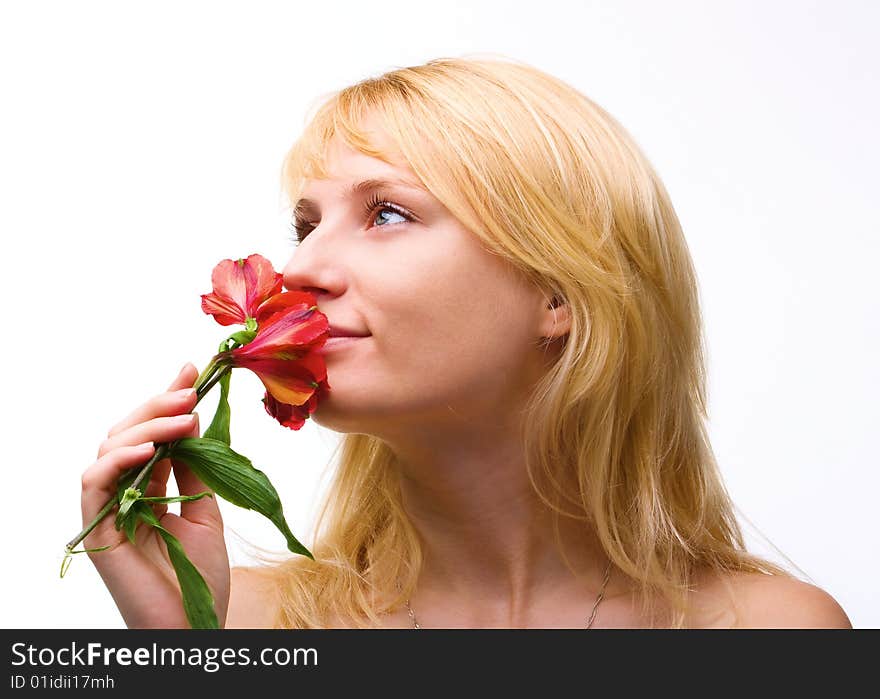 Beautiful girl with flower in hair