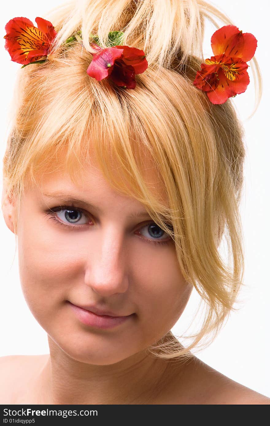 Beautiful girl with flower in hair