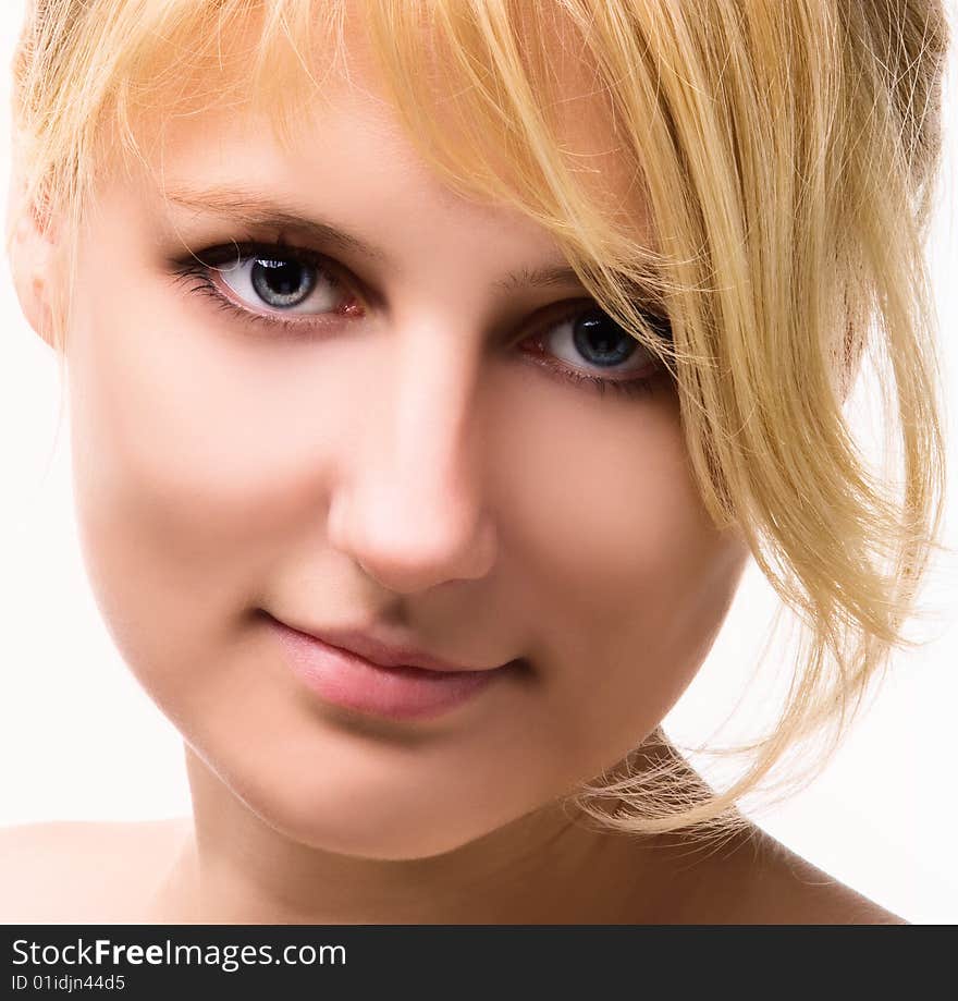 Close-up of beautiful woman face with blond hair