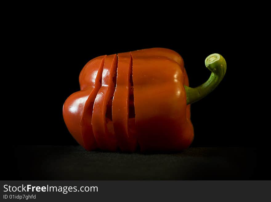 Pepper on a black background