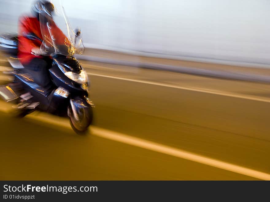 Biker rides for tunnel at high speed