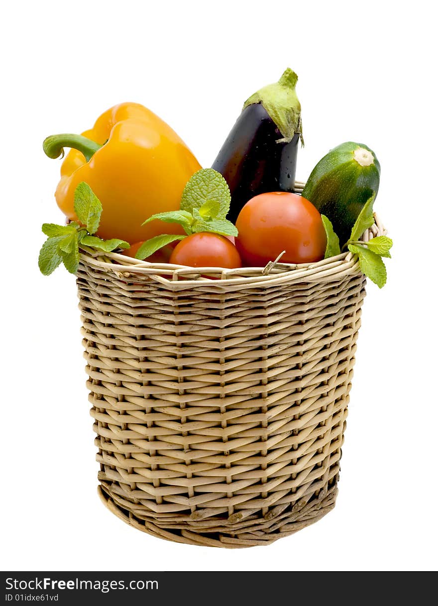 Basket with pepper, eggplant and tomatoes. Basket with pepper, eggplant and tomatoes