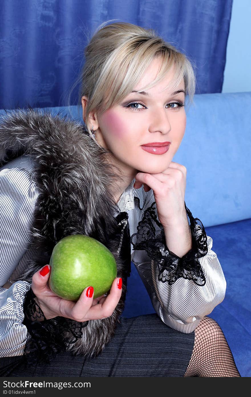 Girl with apple in room