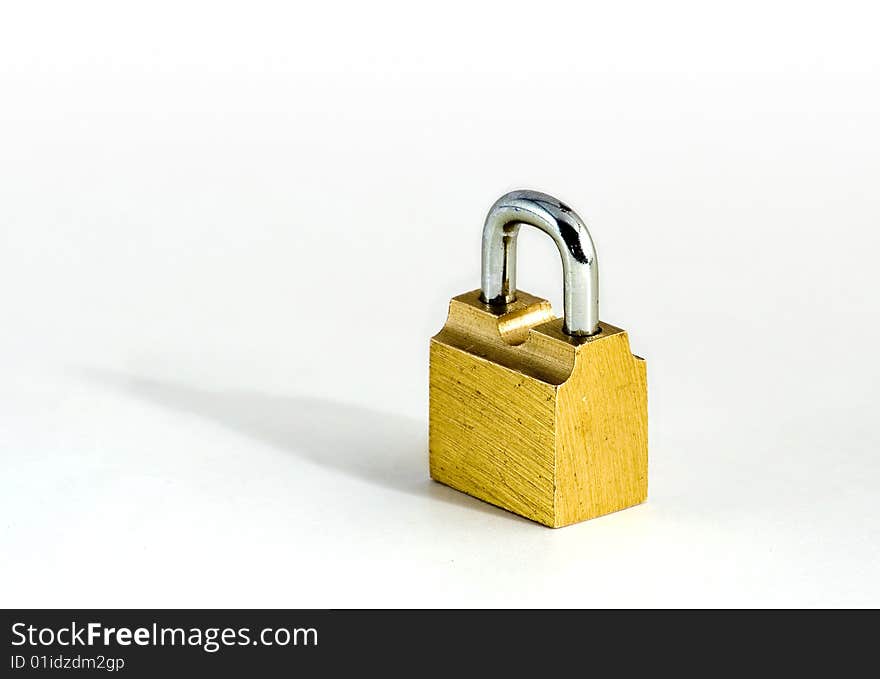 Key and lock of the wanted colour on white background