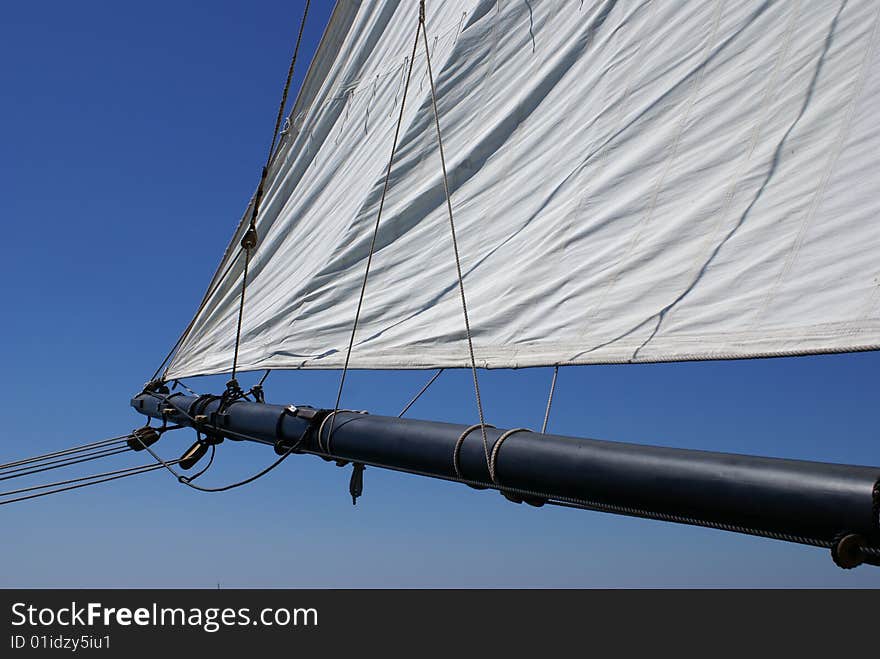 Bow and sail of ship on Lake Michigan in South Haven Michigan.