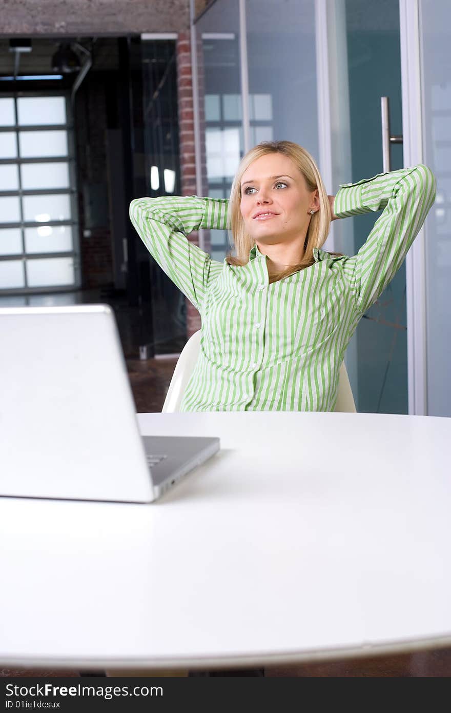 Business woman at her desk in a modern office