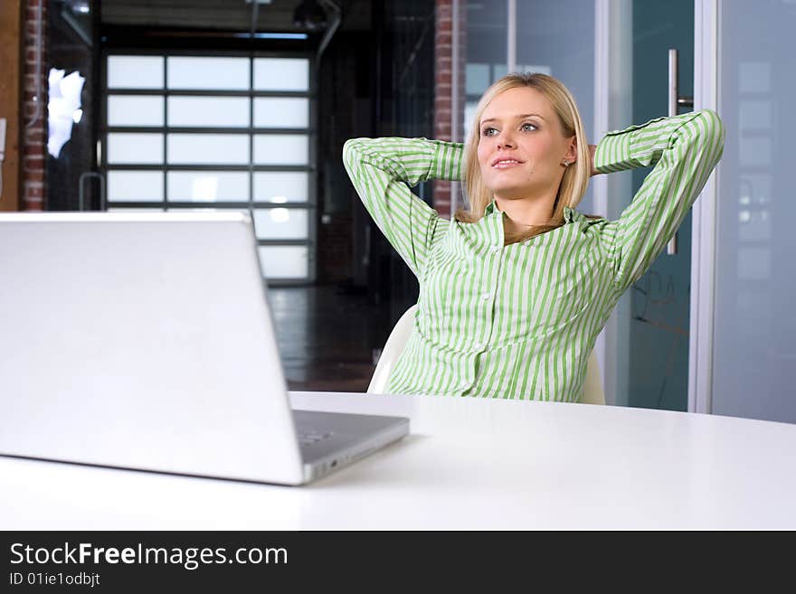 Business woman at her desk in a modern office