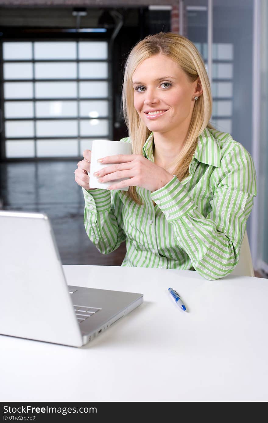 Business woman at her desk in a modern office