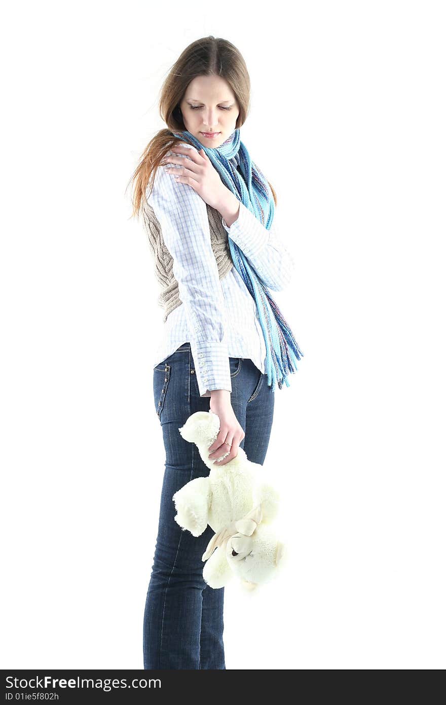 Portrait of young woman with teddy bear isolated on white backgrownd