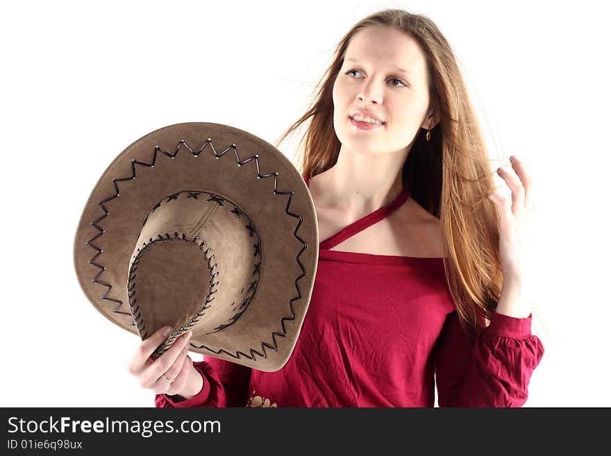 Portrait of young woman in cowboy hat with long hair isolated on white background