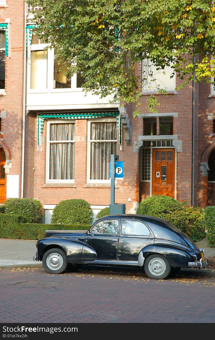 Old car in the street of Amsterdam
