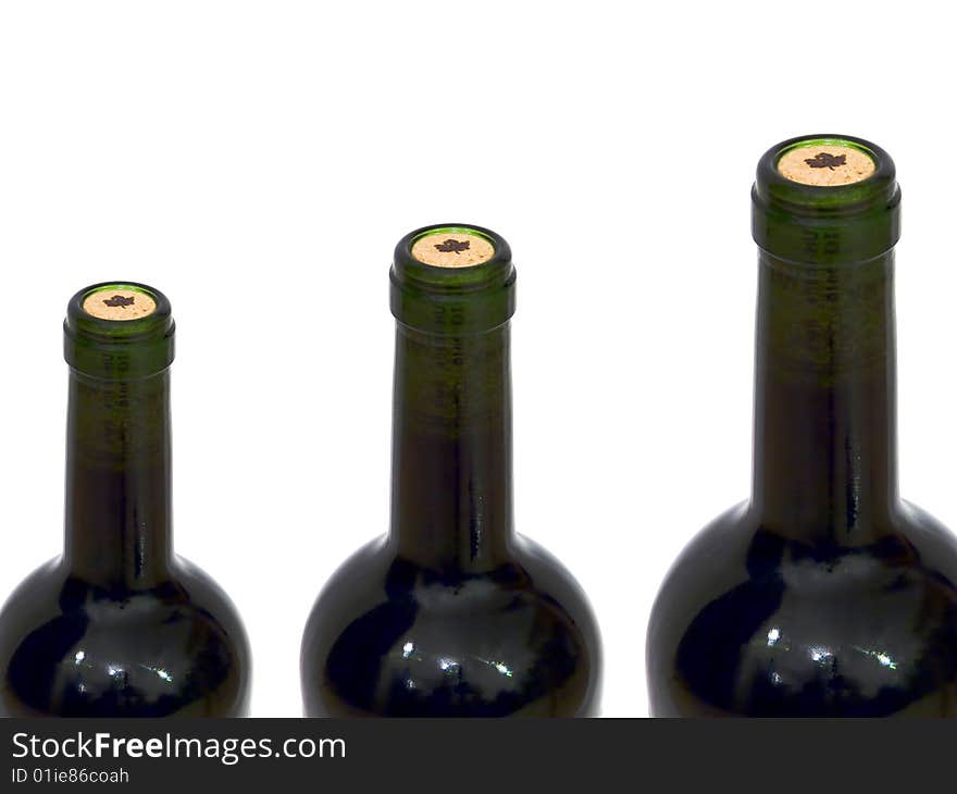 Necks of three bottles of wine on white background. Necks of three bottles of wine on white background