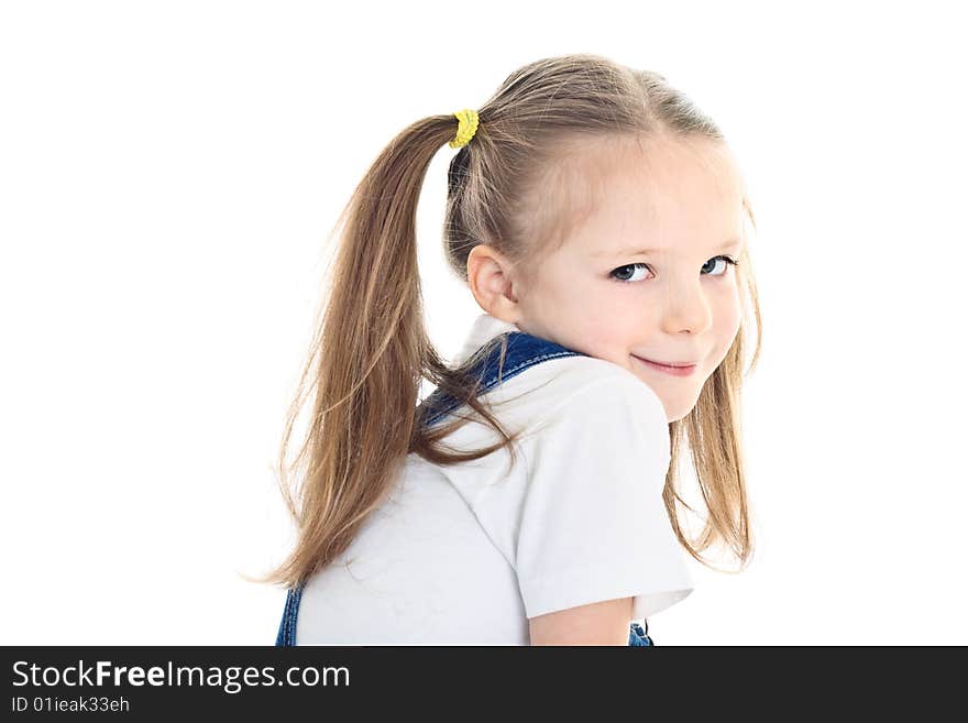 Smiling little girl with ponytails wearing white t-shirt