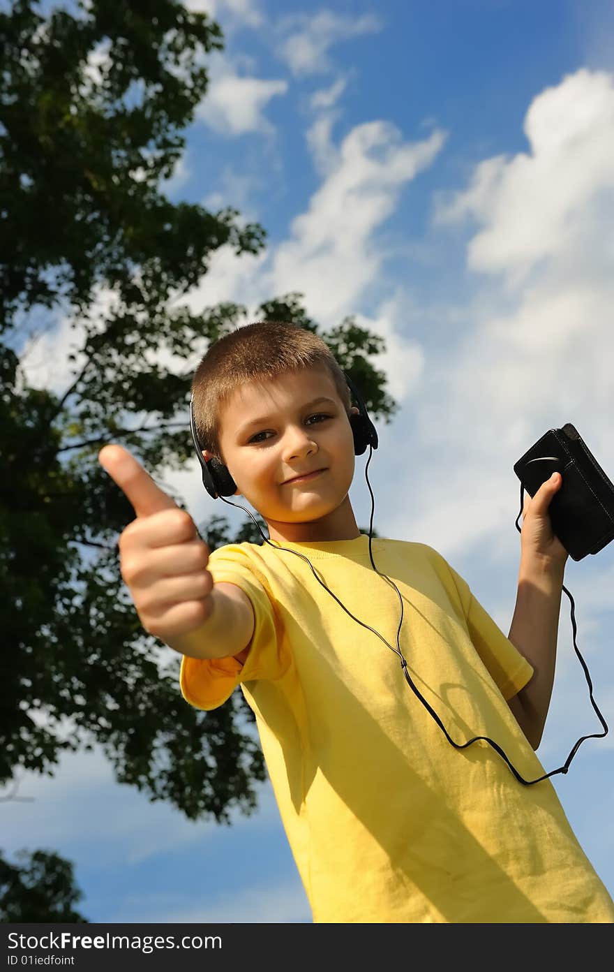 Boy Listens To Music