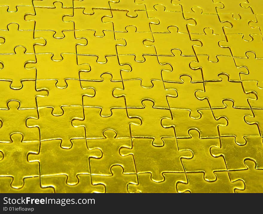 Background of gold jigsaw puzzle