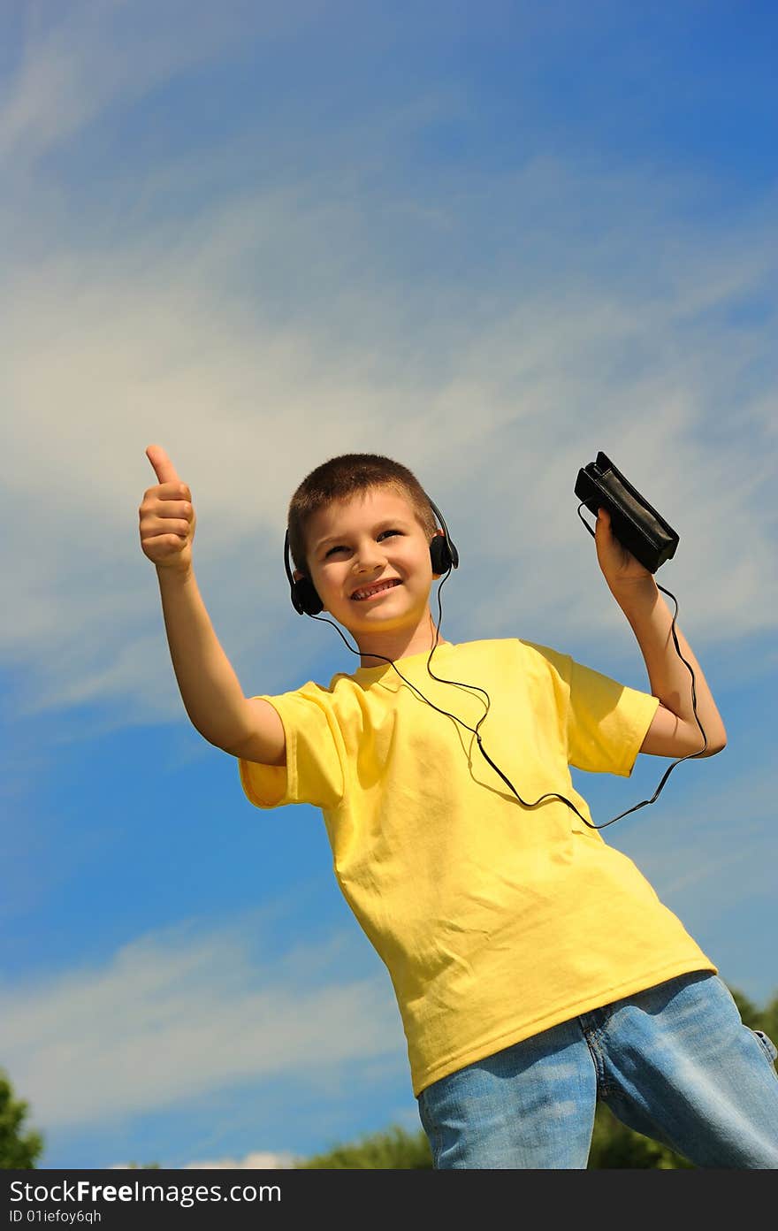 Boy Listens To Music