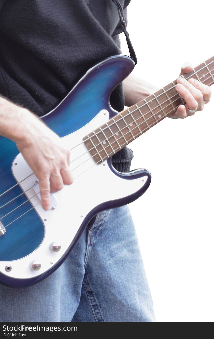 Image of a man playing a bass guitar without plectrum,image isolated on white background. Image of a man playing a bass guitar without plectrum,image isolated on white background