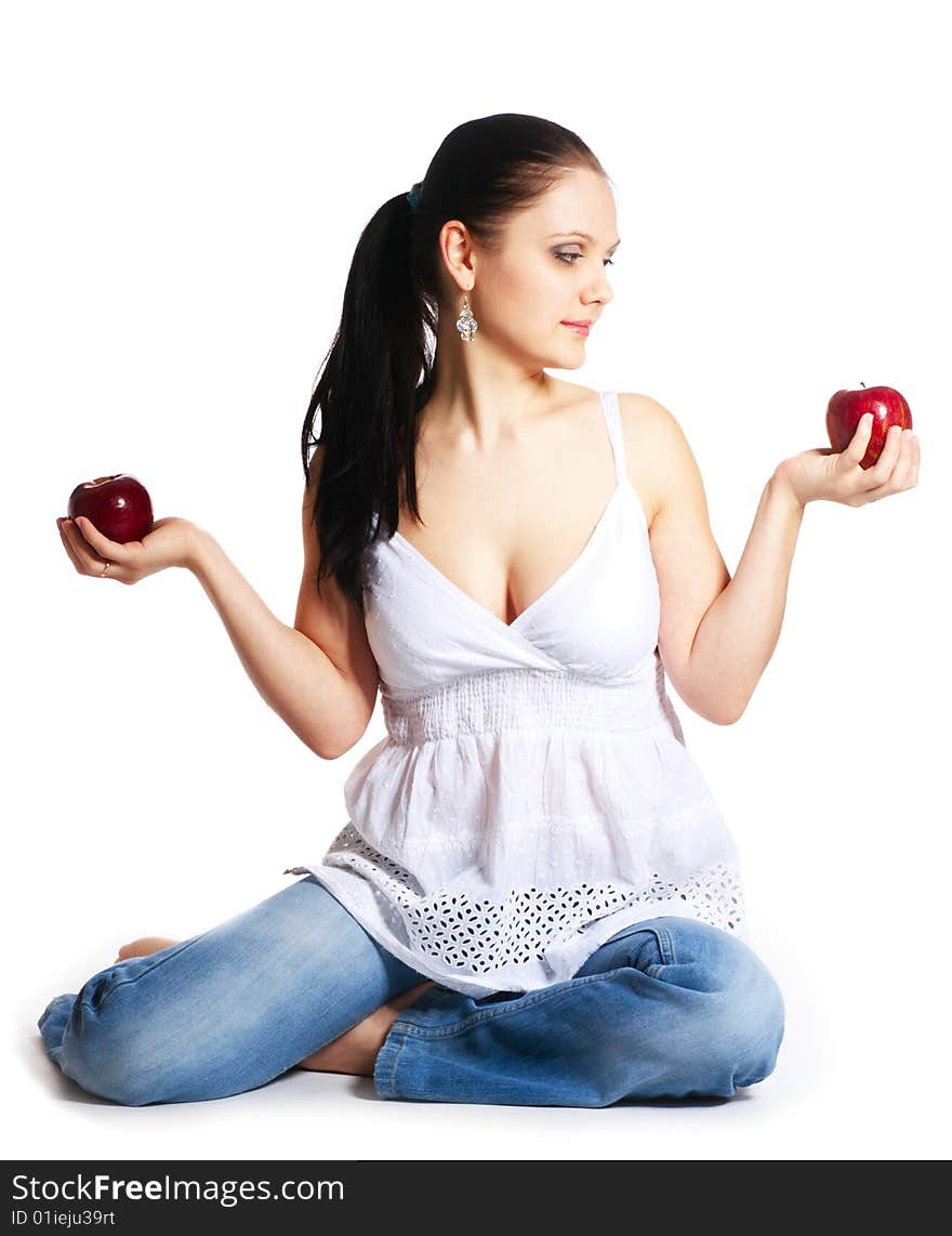 Young woman holding two red apple in her hands. Young woman holding two red apple in her hands