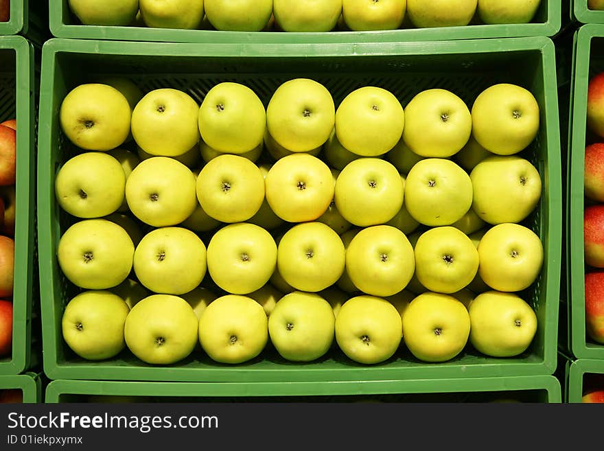 Green apples in the box