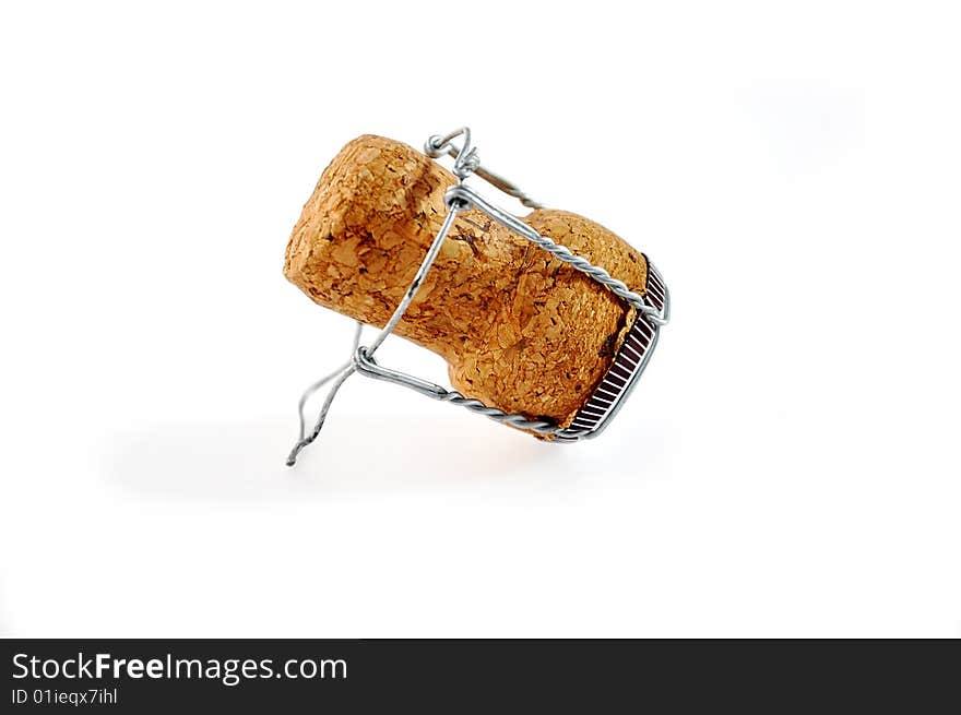 Champagne cork isolated over white.