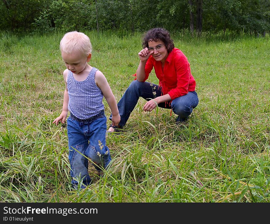 Mother and son relaxing outdoors. Mother and son relaxing outdoors