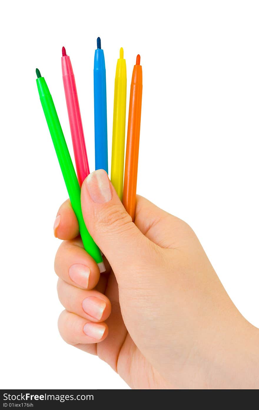 Hand with multicolored pens isolated on white background