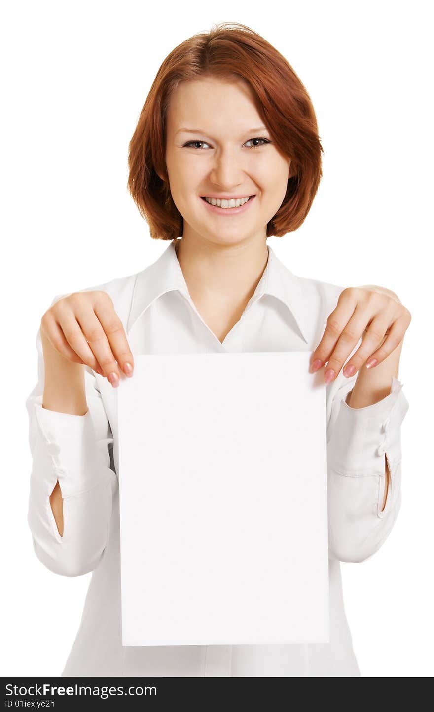 Girl with a white sheet of paper for a slogan. Girl with a white sheet of paper for a slogan