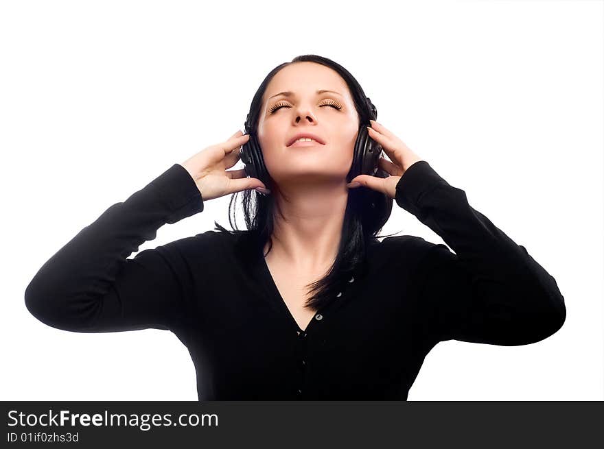 Beautiful young girl dancing in the headphones. Beautiful young girl dancing in the headphones