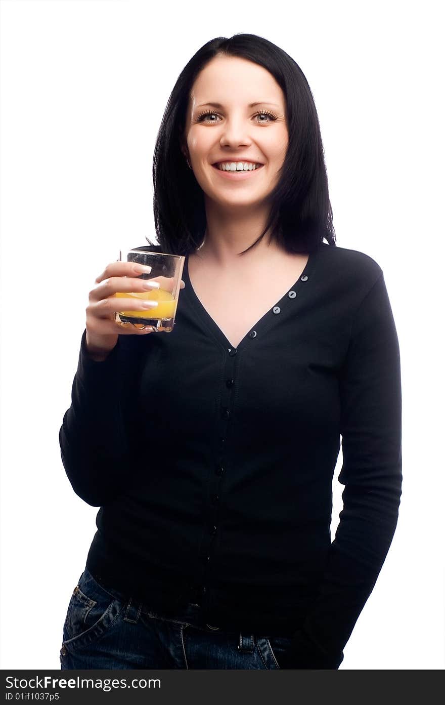 Healthy young woman drinking glass of orange juice