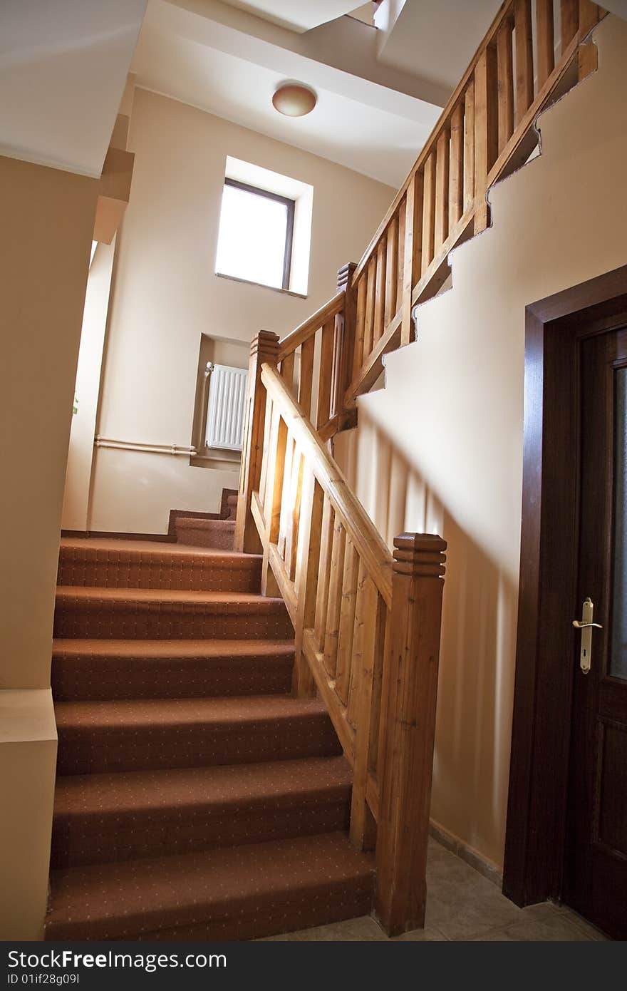 Hotel hall with stairs and steps rustic style