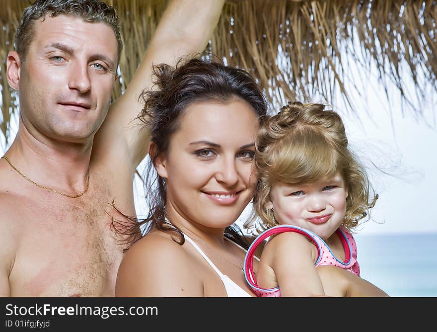 High key portrait of nice young family getting busy. High key portrait of nice young family getting busy