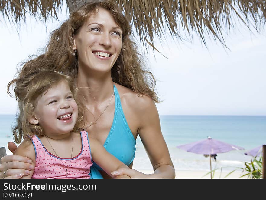 Portrait of beautiful young woman with her daughter. Portrait of beautiful young woman with her daughter