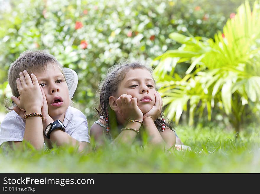 Portrait of little kids having good time in summer environment. Portrait of little kids having good time in summer environment