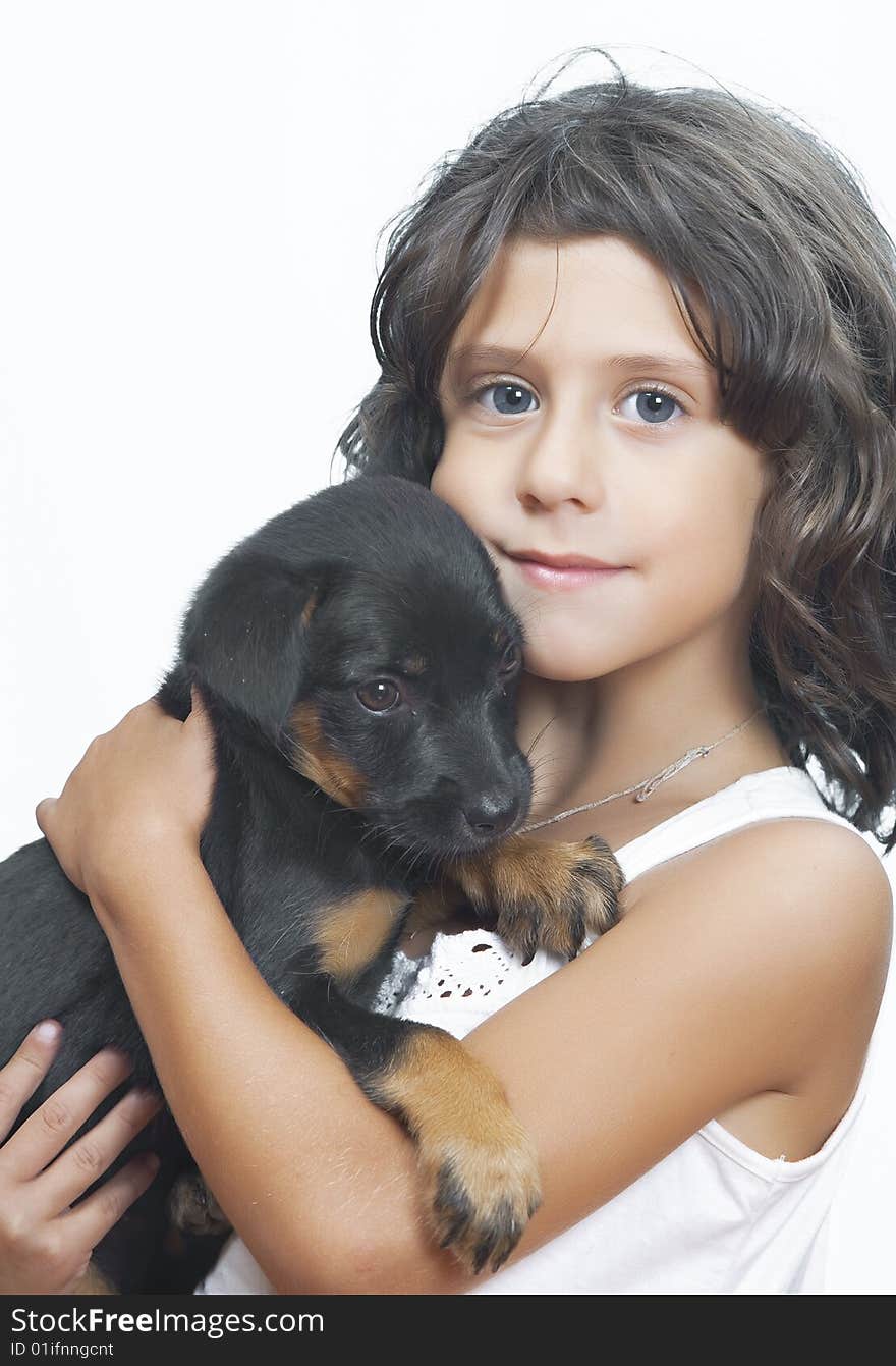 Portrait of little girl having good time with her puppy. Portrait of little girl having good time with her puppy