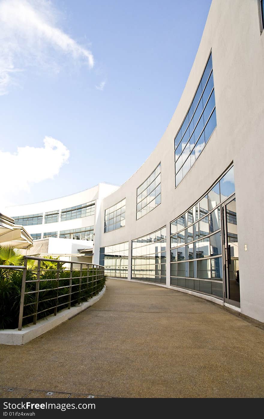 Newly paved walkway leading to a courtyard in front of an office building. Newly paved walkway leading to a courtyard in front of an office building.