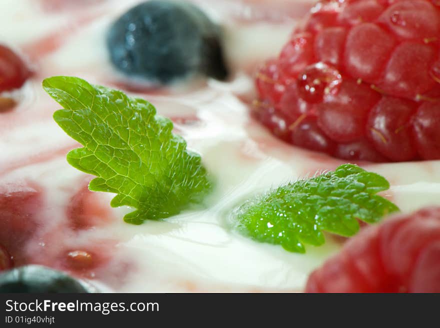 Macro image of berry fruit in yogurt