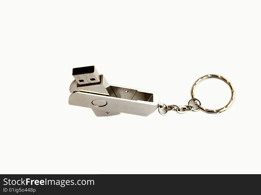 Silver USB memory key which can be folded isolated on white background