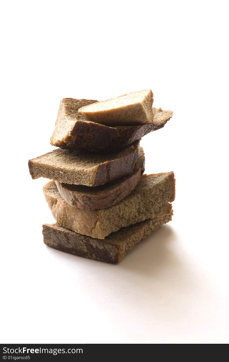 Crackers white and brown bread on a white background. Crackers white and brown bread on a white background