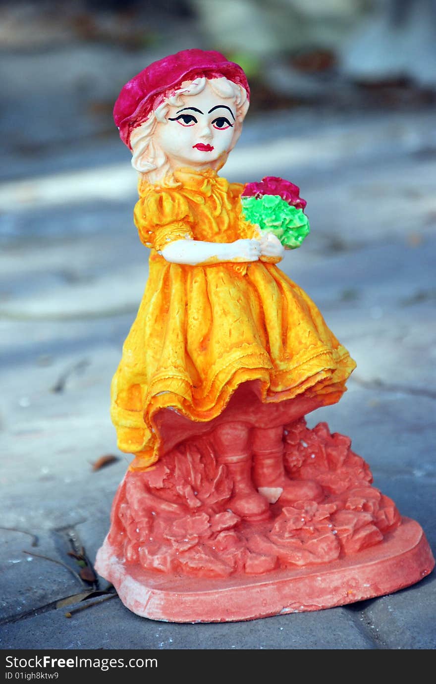 Colorful handmade painted girl toy