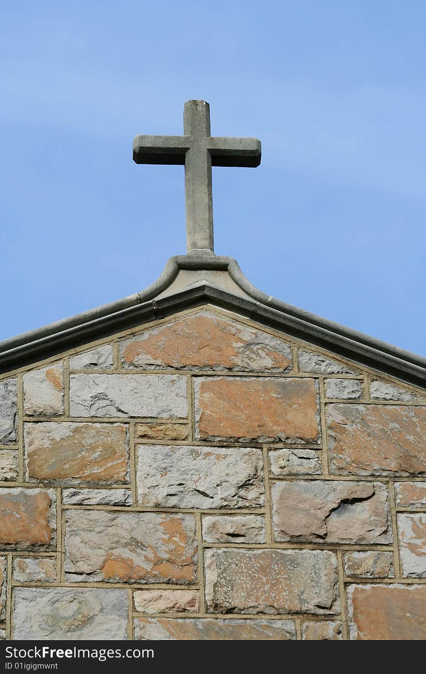 A cross on top of a church building