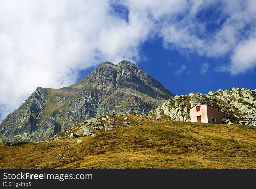 Mountain refuge and sky blue