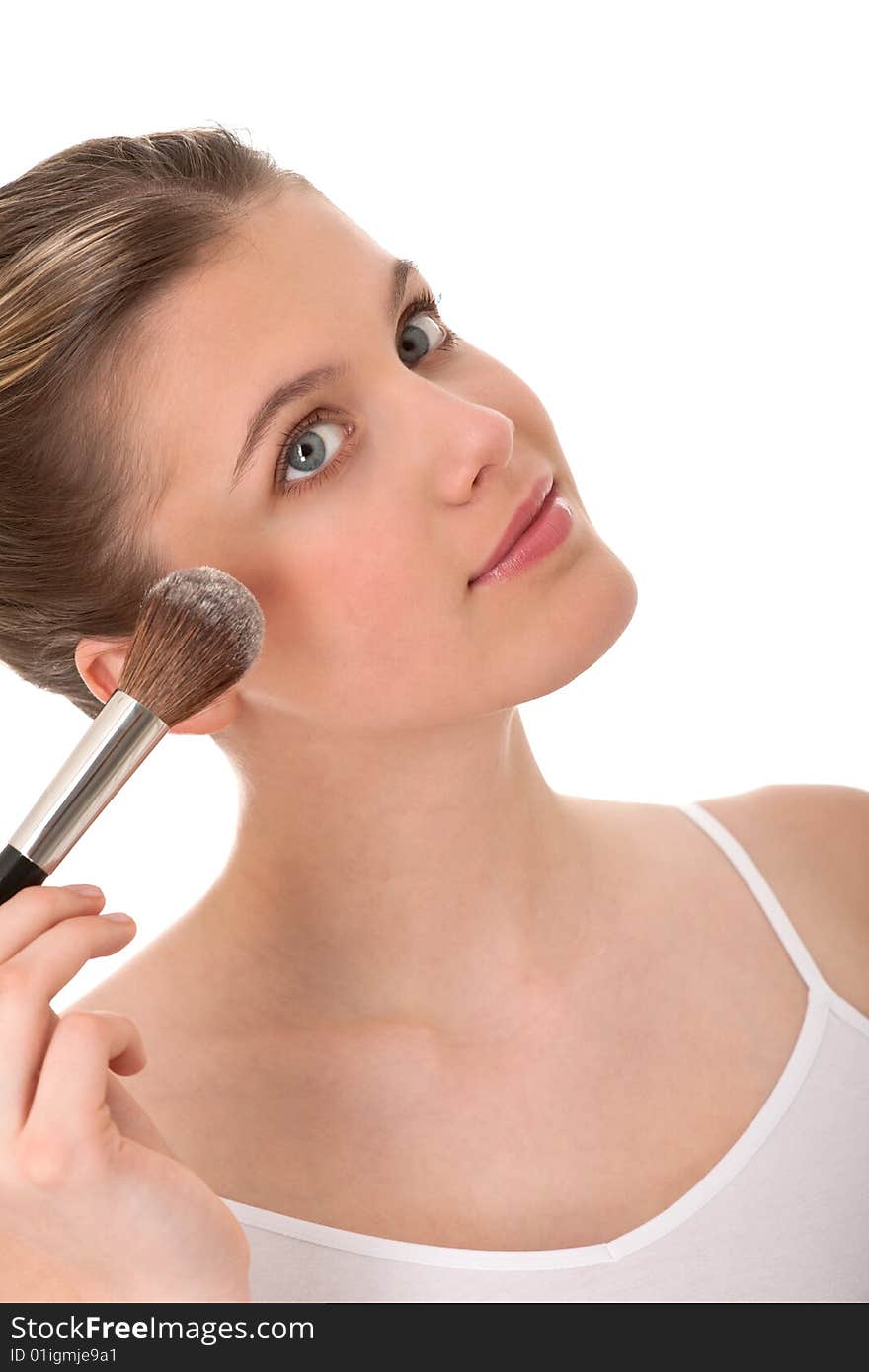 Body care - Young woman doing make-up