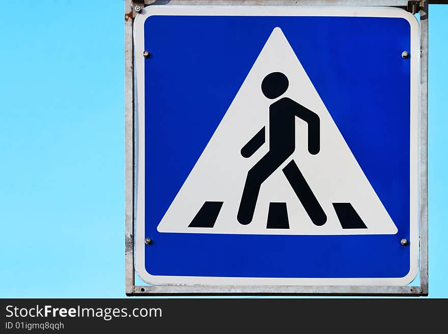 Road sign on pedestrian crossing