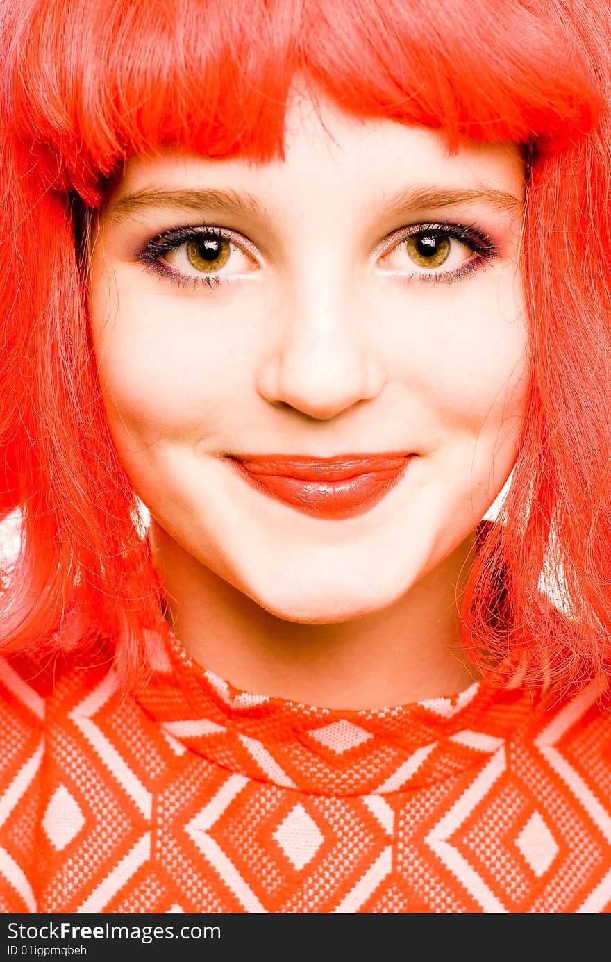 Baby doll girl with red hair closeup portrait. Baby doll girl with red hair closeup portrait