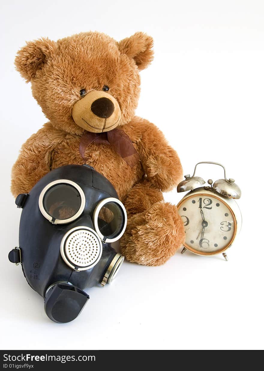 The Nursery toy, gas mask, old watch on white background. The Nursery toy, gas mask, old watch on white background.