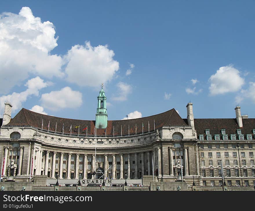 Large british building against blue sky